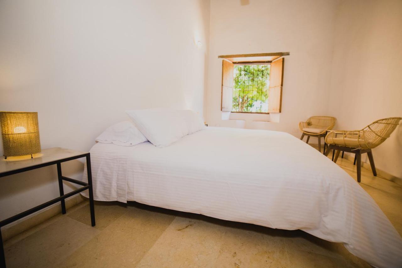 Karakali Boutique Hotel Mompos Buitenkant foto